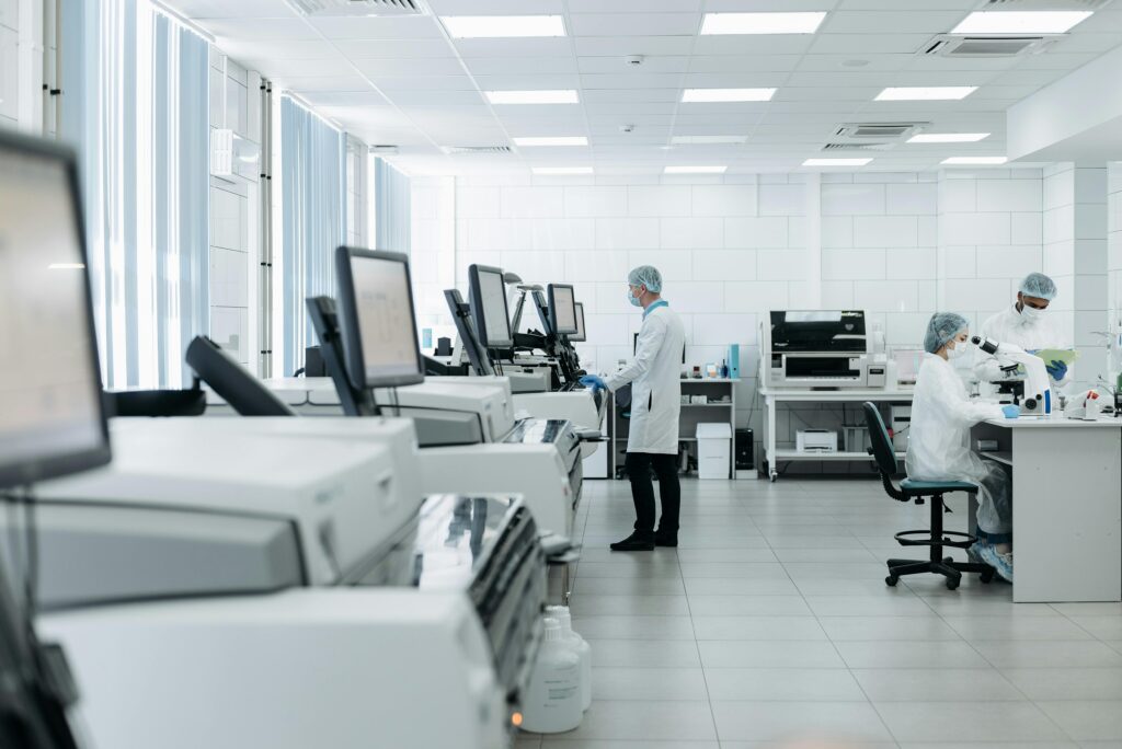 pexels-photo-8442105-8442105 Scientists conducting research in a state-of-the-art laboratory with advanced equipment.